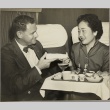Ruth Befu serving a meal on an airplane (ddr-njpa-5-365)
