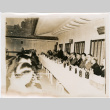 Group of men sitting at banquet table, with man making speech (ddr-densho-426-2092)