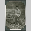 Toshiko Taniguchi standing near boat (ddr-densho-540-41)