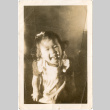 Girl smiling at camera (ddr-densho-430-179)
