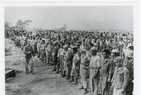 Prisoners lined up for roll call at Kadena POW camp (ddr-densho-1007-261)
