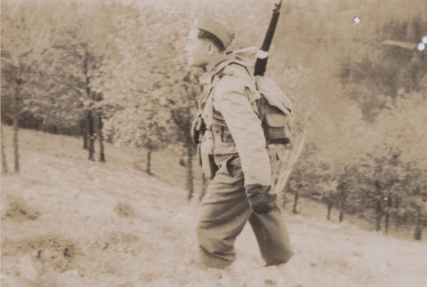 Soldier climbing hill (ddr-janm-17-26)