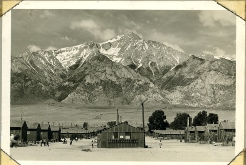 View of barracks with mountains in the background (ddr-manz-4-2)
