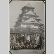 Group posing in front of large building (ddr-densho-326-191)