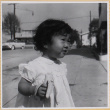 Susan Shiomi eating a banana (ddr-densho-522-310)