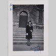 Woman standing on steps outside building (ddr-densho-464-118)