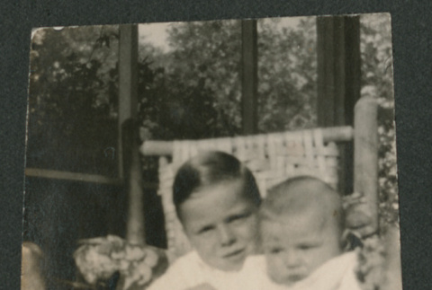 boy and baby in rocking chair (ddr-densho-378-702)