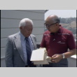 Harry Akune and Jim Ariyasu on balcony (ddr-densho-1007-1595)