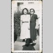 Two women stand outside (ddr-densho-321-276)