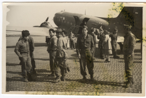 Soldiers stand outside a plane (ddr-densho-451-37)