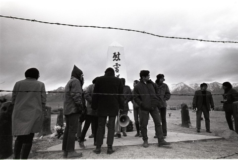 Pilgrims gathered in front of the Manzanar Cemetery Monument (ddr-manz-3-30)