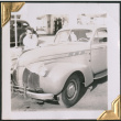 Man standing by car (ddr-densho-434-131)