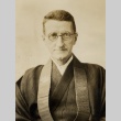 Ernest Shinkaku Hunt posing in vestments (ddr-njpa-2-444)