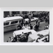 Black and White photo of baseball team boarding bus (ddr-densho-426-17)
