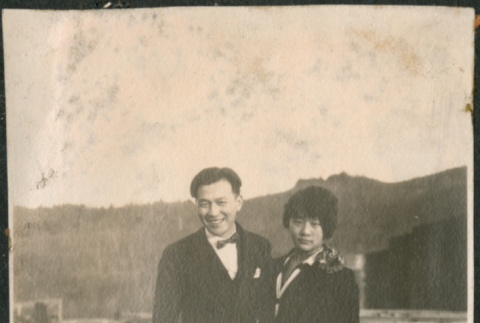 Couple standing on boardwalk (ddr-densho-523-16)