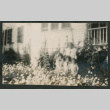 woman and three kids outside a house (ddr-densho-378-689)