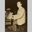 A man playing the piano (ddr-njpa-1-483)