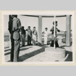 Boy Scouts at monument flag pole (ddr-densho-37-1469)