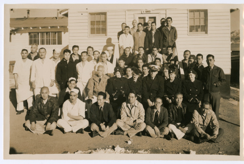 Group photo in front of A Ward at a medical facility (ddr-densho-515-3)