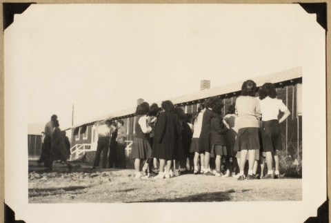 Group outside a Rohwer barrack (ddr-densho-542-586)