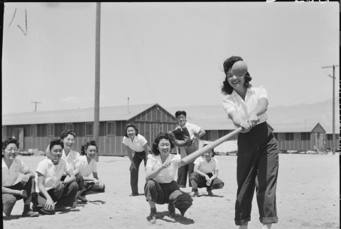 Women playing softball (ddr-densho-37-332)