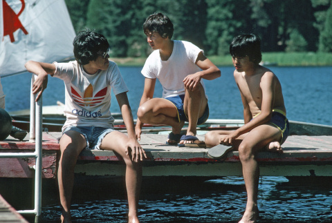 Campers sitting on the dock (ddr-densho-336-1134)