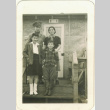 Mother with two children and family friend (ddr-densho-118-13)