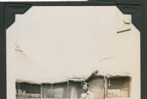 Man in front of barracks (ddr-densho-545-34)