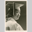 Studio portrait of woman in cap and gown (ddr-densho-430-229)