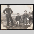 Woman and two boys on a rocky shore (ddr-densho-404-98)