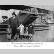 Takuritsu Morita with five young children standing by bi-plane (ddr-ajah-6-632)