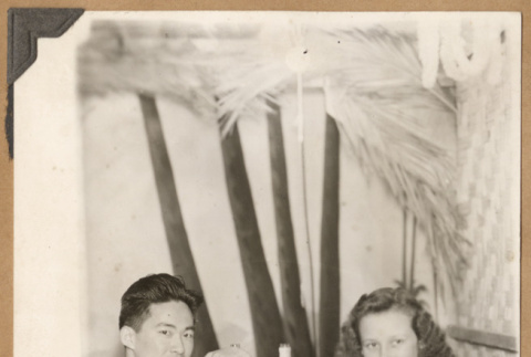 Gary Kikawa and woman at a table (ddr-densho-542-67)