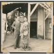 Couple standing under an awning (ddr-densho-433-775)
