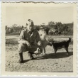 Soldier with puppies (ddr-densho-201-102)