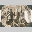 Eight men posing for photo, one holding baseball bat (ddr-ajah-2-354)