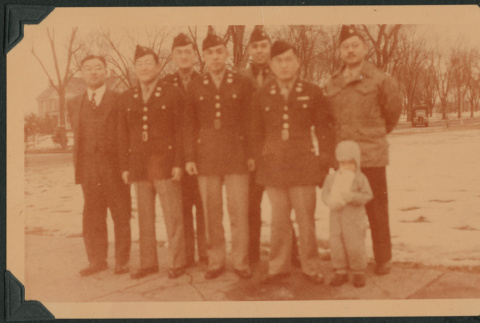 Military men pose with child (ddr-densho-397-27)