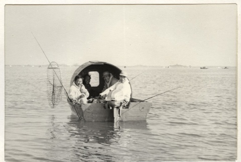 Group of men fishing on a boat (ddr-jamsj-1-516)