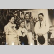 Takiko Mizunoe and Shirley Temple posing with others (ddr-njpa-4-742)