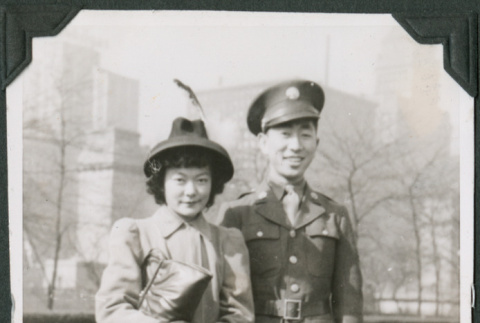 Joe Iwataki and woman standing in park (ddr-ajah-2-488)