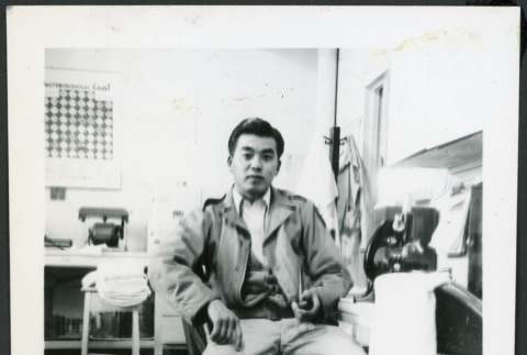 Photograph of a lab technician in the Manzanar hospital (ddr-csujad-47-201)