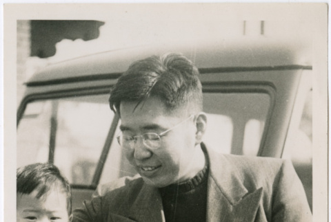 Henri and Norman Takahashi by car (ddr-densho-426-1050)