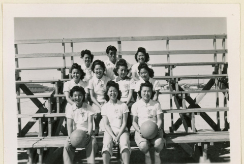 Girl's basketball team seated (ddr-densho-37-1071)
