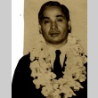 Kuniyoshi Obara wearing leis (ddr-njpa-4-1710)