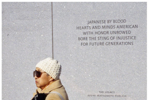 Meriko in front of a Japanese American memorial (ddr-densho-494-29)
