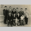Family in front of barracks (ddr-densho-159-302)