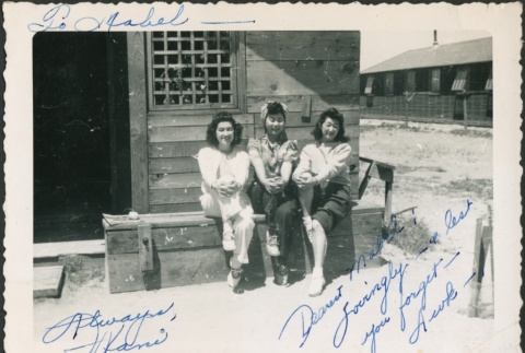 Three girls outside barracks (ddr-densho-298-38)