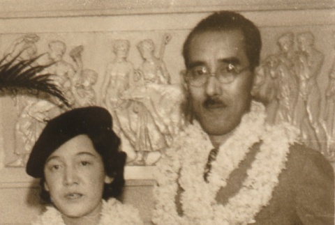 Husband and wife posing with leis (ddr-njpa-4-1504)