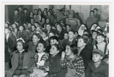 Orphaned children at a Christmas party given by Company F of the 442nd (ddr-densho-1007-351)