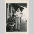 Joe Watanabe holding his twin babies (ddr-densho-37-1429)