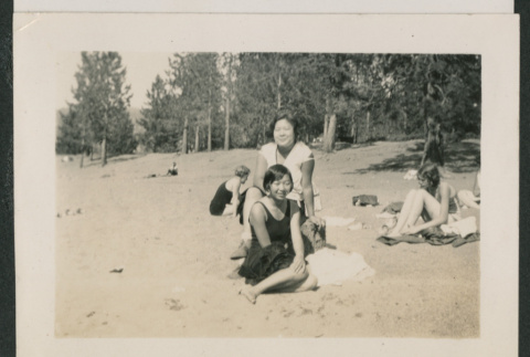 2 women on a wooded beach (ddr-densho-378-855)